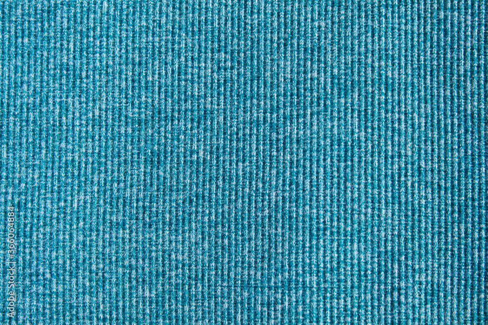 The texture of the elastic blue fabric. Aquamarine The texture of the elastic blue fabric. Aquamarine