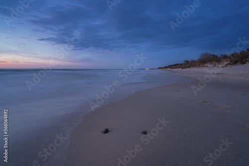 Fototapeta Naklejka Na Ścianę i Meble -  calm sea after sunset, long exposure