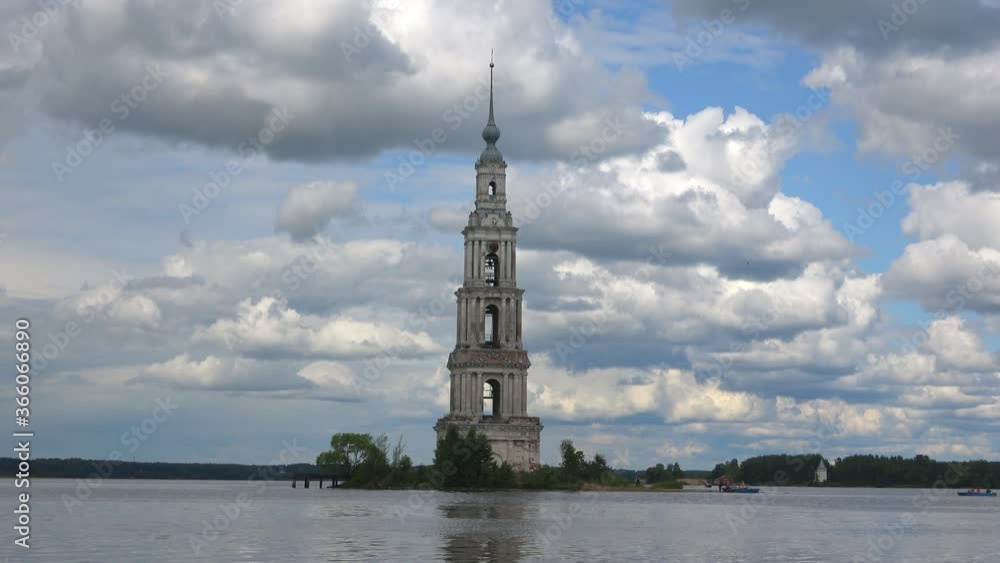 Flooded bell tower of St. Nicholas Cathedral close-up, cloudy July evening. Kalyazin, Russia Flooded bell tower of St. Nicholas Cathedral close-up, cloudy July evening. Kalyazin, Russia