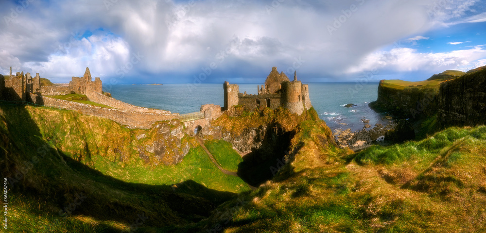 Fototapeta premium Dunluce Castle is a medieval castle in Bushmills Northern Ireland - panorama