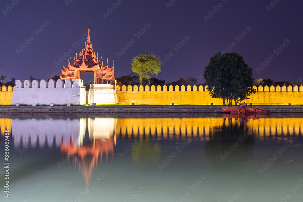 Royal palace illuminated at night in Mandalay Burma, Myanmar