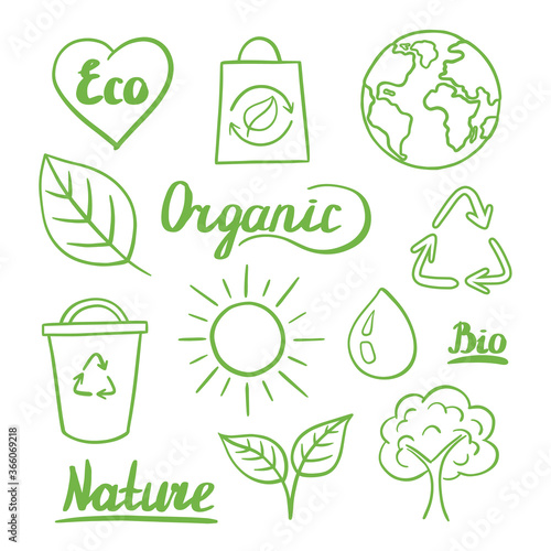 Set of hand drawn ecological signs. Green symbols on a white background. Vector illustration in the Doodle style.
