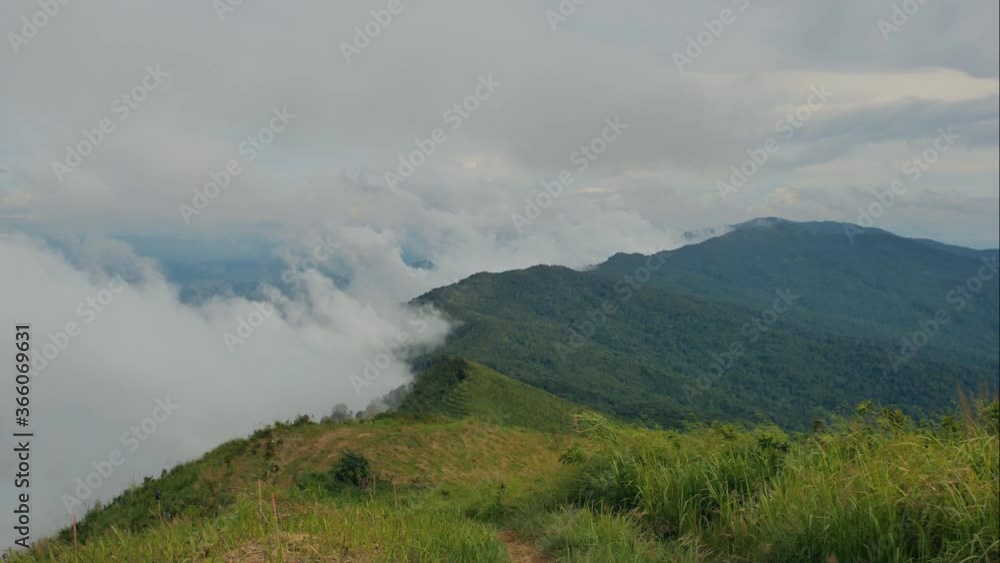 Time Lapse of The mist flowing in between hills on Mountain of Doi Suan Ya Luang, Nan province, Thailand. Time Lapse of The mist flowing in between hills on Mountain of Doi Suan Ya Luang, Nan province, Thailand.
