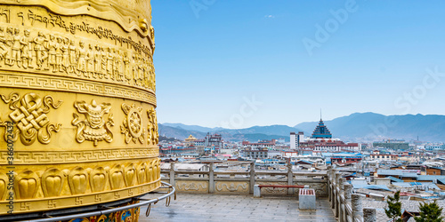 Slika na platnu Panoramic scenery of Dukezong ancient city and prayer wheels in Shangri-La, Yunn
