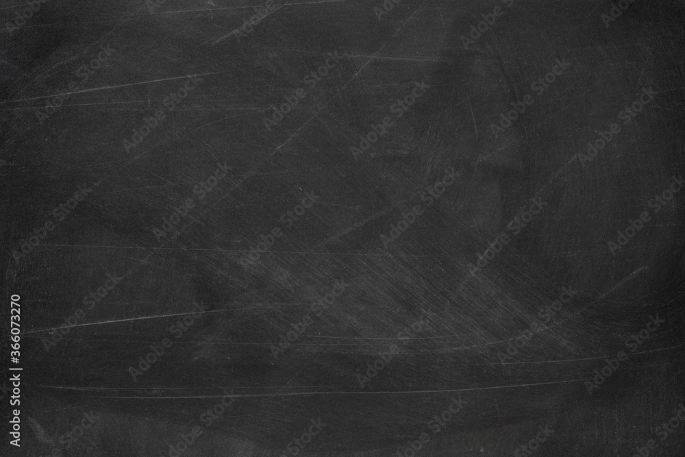 Naklejka premium Texture of chalk rubbed out on blackboard or chalkboard background. School education, dark wall backdrop or learning concept.