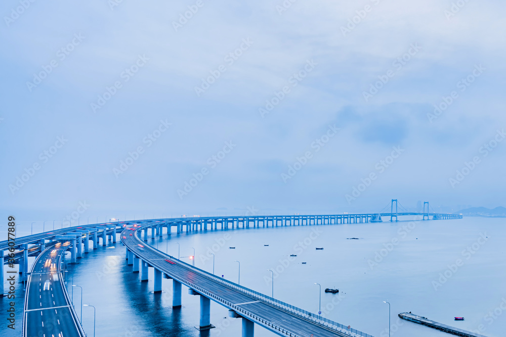 Fototapeta premium Night scenery of Dalian Sea Crossing Bridge, Liaoning, China