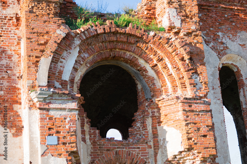 Naklejka premium the old ruined Church of red kurpitsa in the village 