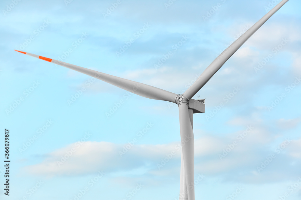 Windmill for electric power on sky background Windmill for electric power on sky background