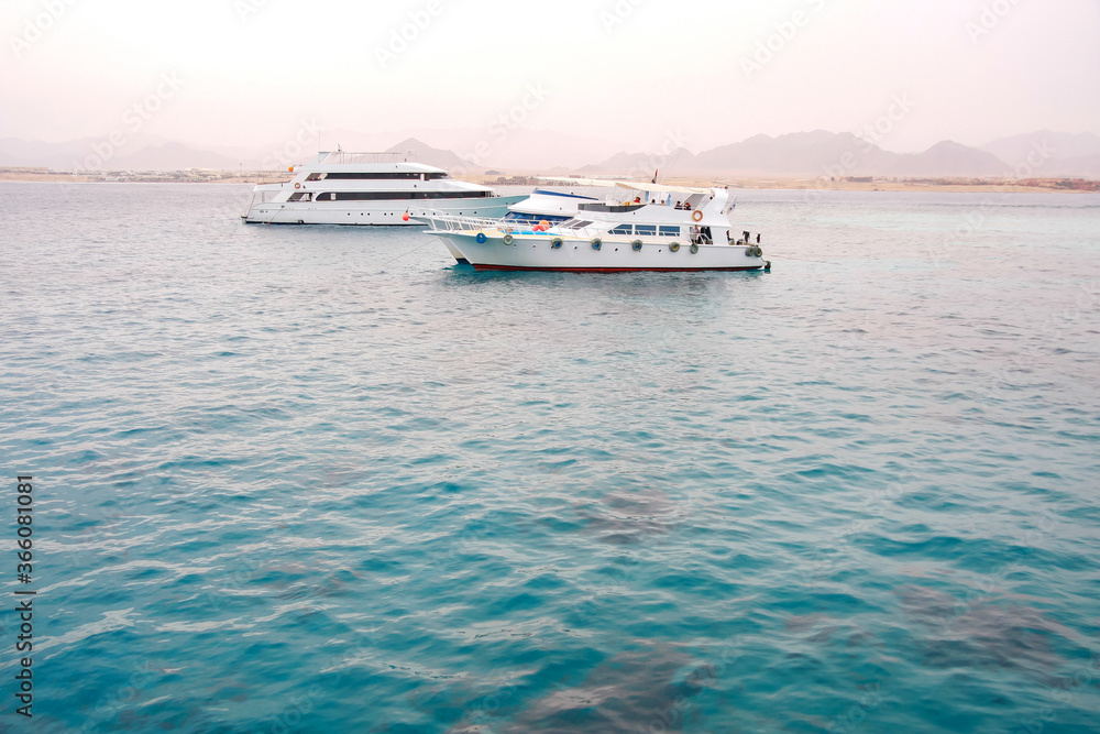 Tourist yachts in egypt. View of the Red Sea and the coast. Tourist yachts in egypt. View of the Red Sea and the coast.