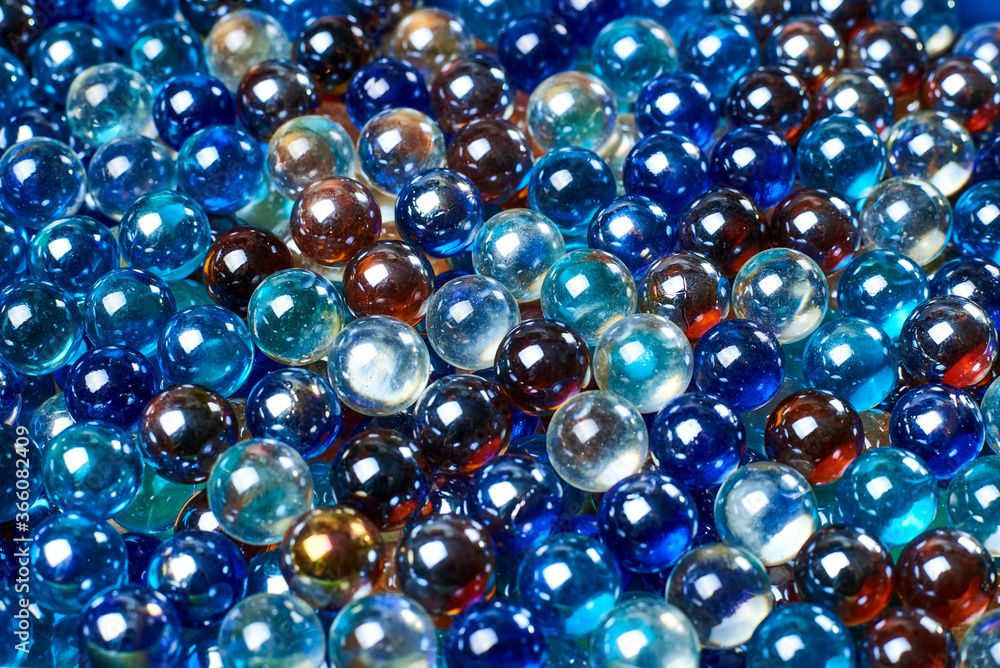A lot of multi-colored glass balls. Can be used as background. A lot of multi-colored glass balls. Can be used as background.