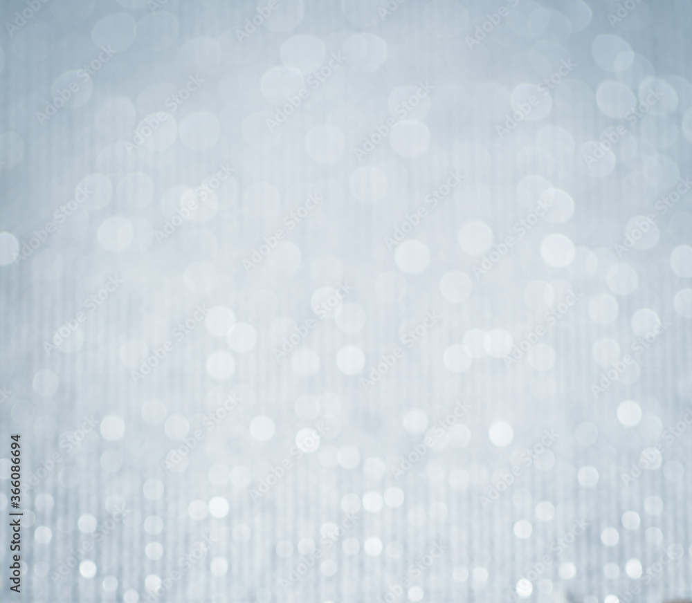 Light blue surface with lighter circles, beautiful bokeh effect Light blue surface with lighter circles, beautiful bokeh effect