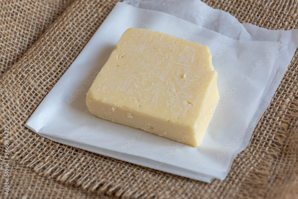 block of cheddar cheese 
