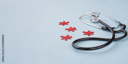 Stethoscope and virus on a blue background. Greeting background. National doctor's day. Happy nurse 's day. Health day. World Tuberculosis Day. COVID-19. Top view, a copy of the space.