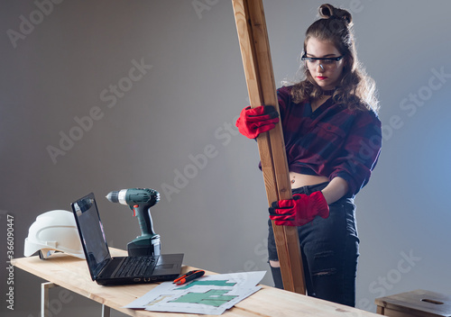 Woman makes repairs with he...