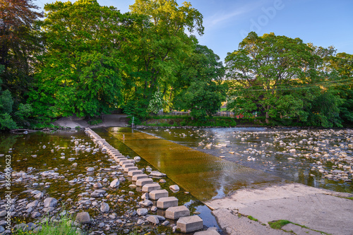 Ford and Stepping Stones across River Wear at Stanhope, which is a small market town in County Durham situated on the upper reaches of the River Wear in Weardale photo
