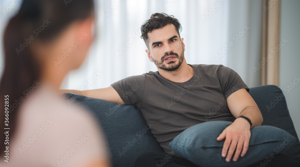 Woman and man couple in social distancing at home Woman and man couple in social distancing at home