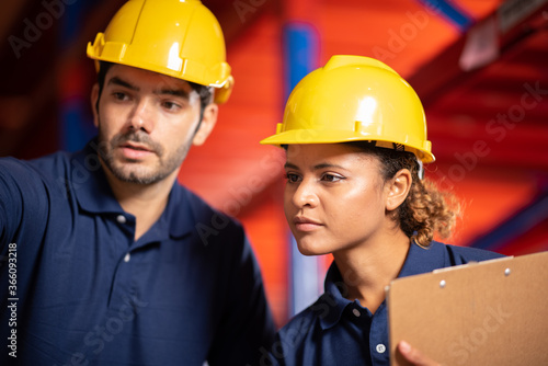 Group of warehouse workers ...