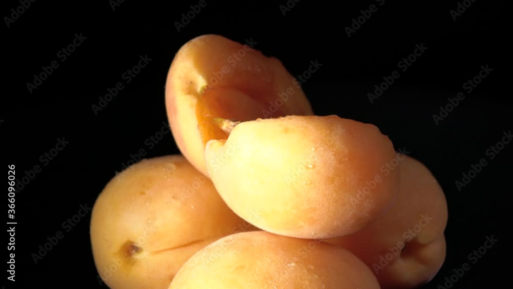 Apricots on a black background Apricots on a black background