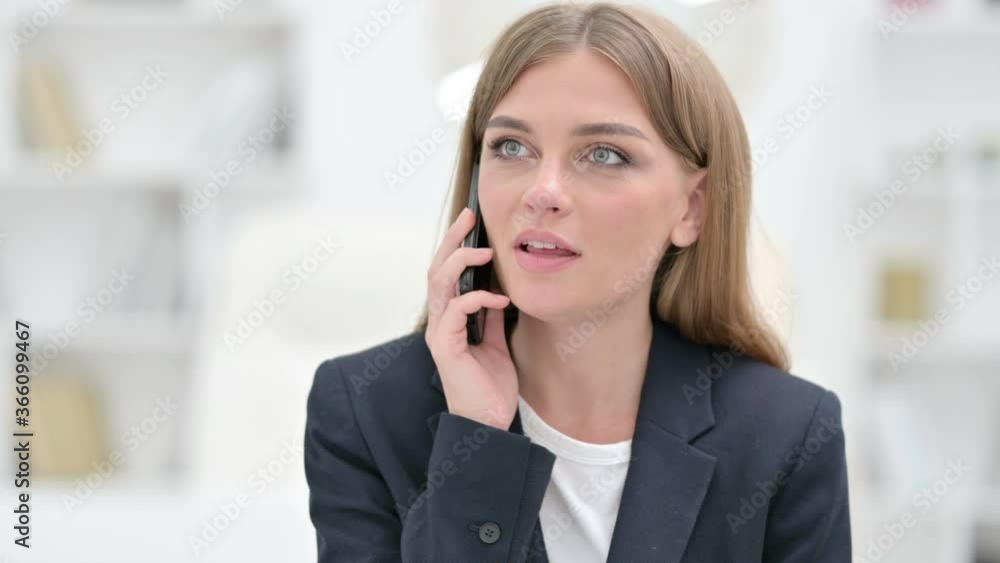 Portrait of Cheerful Businesswoman Talking on Smartphone Portrait of Cheerful Businesswoman Talking on Smartphone