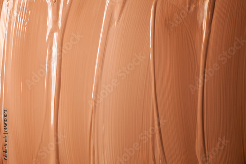 Texture of smudge cosmetic cream foundation liquid background photo