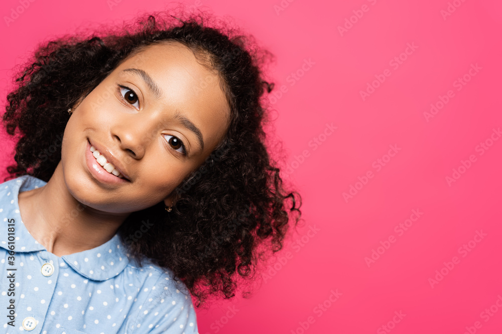 smiling cute curly african american kid looking at camera isolated on pink smiling cute curly african american kid looking at camera isolated on pink