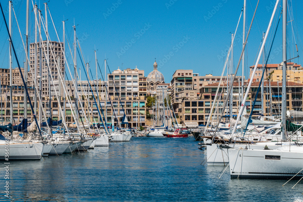 Panoramic view of boats moored in the Old Port of Marseille. It has been the natural harbor of the city since antiquity and is now the main popular place in Marseille. 