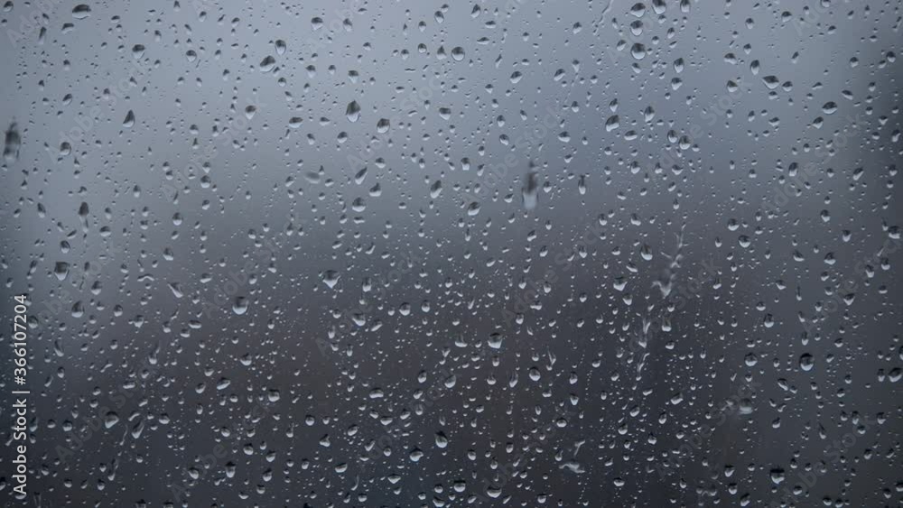 Rain drops flowing over a window on a rainy day.
The falling rain drops calm your mind.
I just want to look out the window. Rain drops flowing over a window on a rainy day.
The falling rain drops calm your mind.
I just want to look out the window.