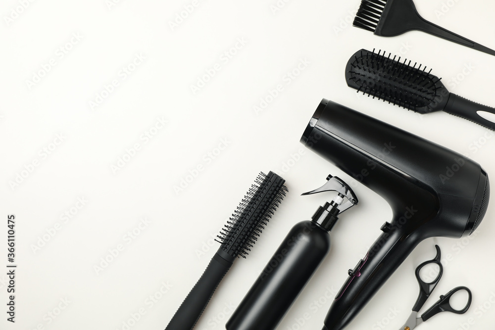 Composition with hairdresser accessories on white background, space for text Composition with hairdresser accessories on white background, space for text
