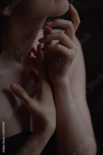 girl gestures and hand movements near the face