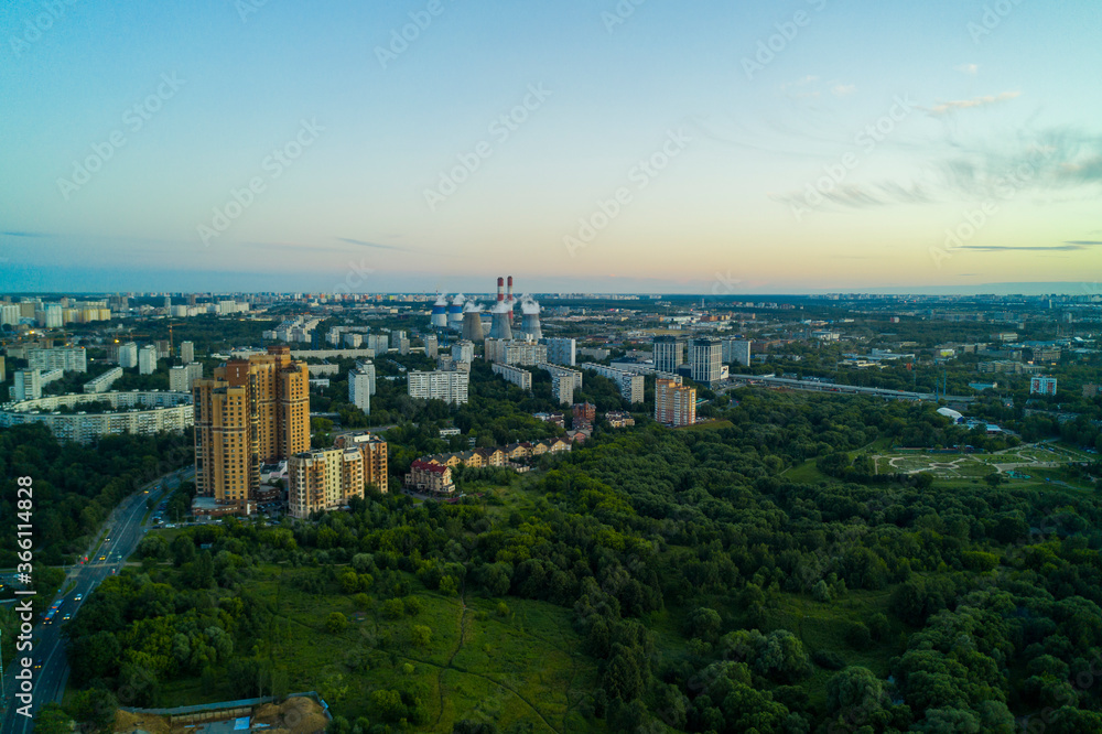 Fototapeta premium panoramic views of the city infrastructure in the evening filmed from a drone
