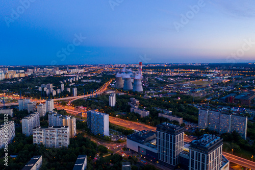panoramic views of the city infrastructure in the evening filmed from a drone