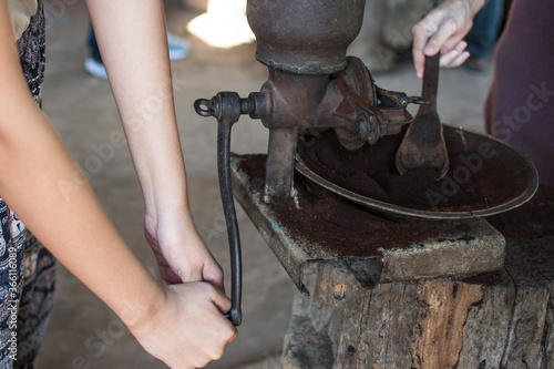 Coffee grinder and boiling water to brew coffee of the hill tribe people at Doi Inthanon National Park, Thailand