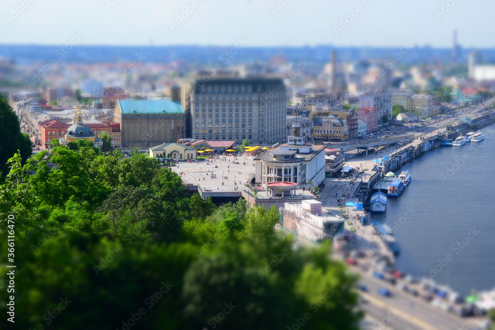 Fototapeta premium Summer panorama of the city with miniature effect 