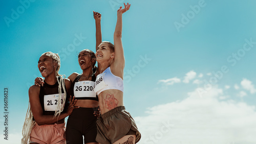Group of runners celebrating success