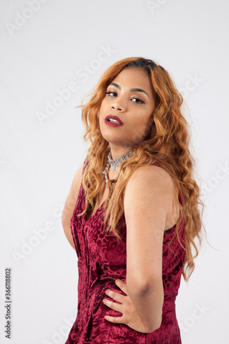 Thoughtful Hispanic woman with Red hair
