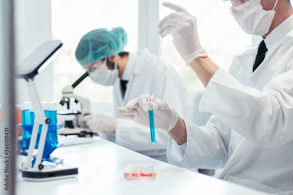 background image scientists are conducting research in the laboratory. background image scientists are conducting research in the laboratory.