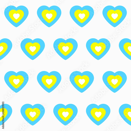 Pattern with blue, yellow and white hearts on a gray background