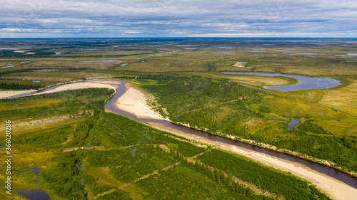 Landscape of the forest-tundra and the sandy river bank  bird s eye view.Arctic Circle  tunda. Beautiful landscape of  tundra from a helicopter.