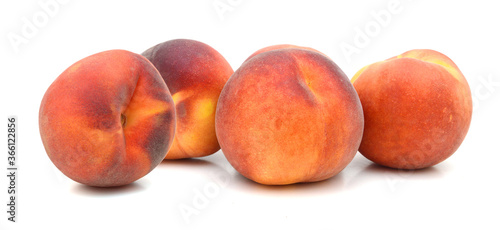sweet peaches on a white background 