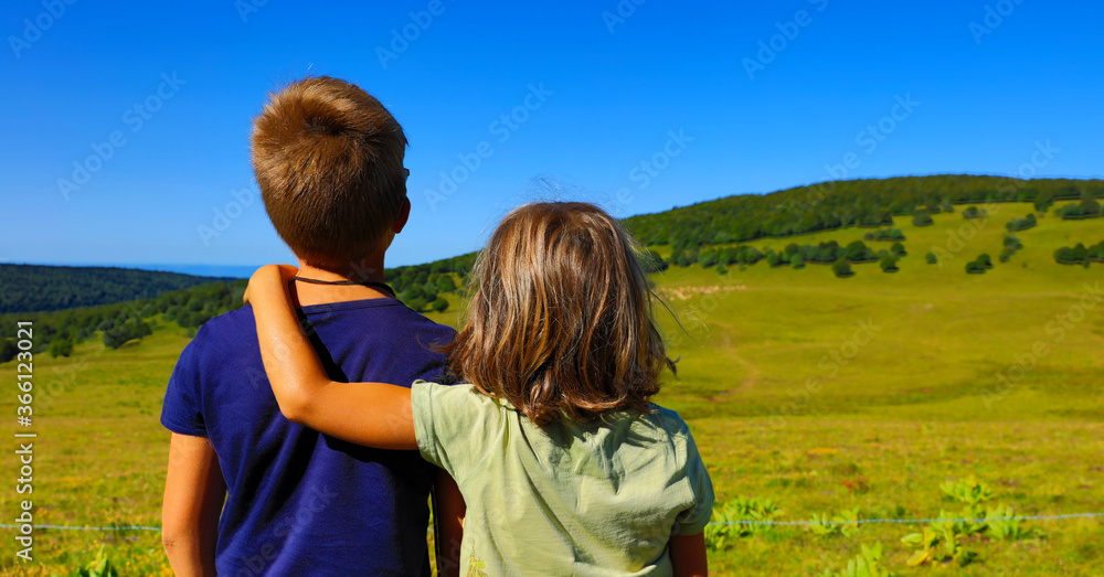 Fototapeta premium two children looking at landscape France view