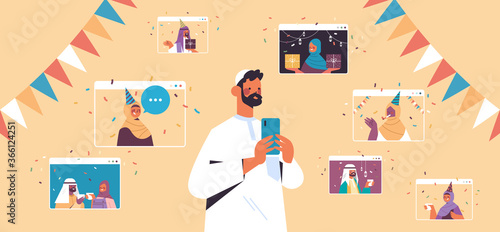 arab man celebrating online birthday party during virtual meeting with arabic friends in web browser windows celebration self isolation concept horizontal vector illustration