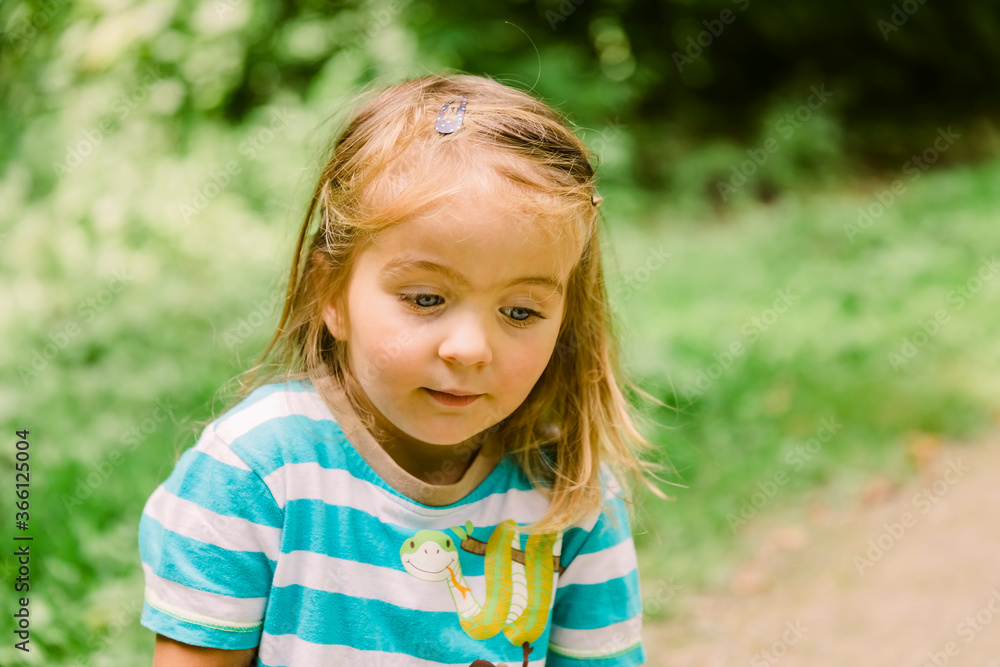 Toddler girl portrait in forest Toddler girl portrait in forest
