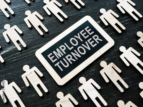 Plate with words Employee Turnover and figures. photo