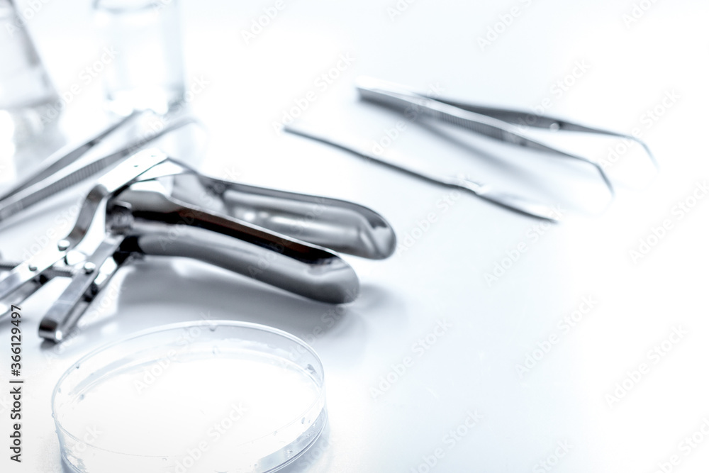 instruments of gynecologist on white background instruments of gynecologist on white background