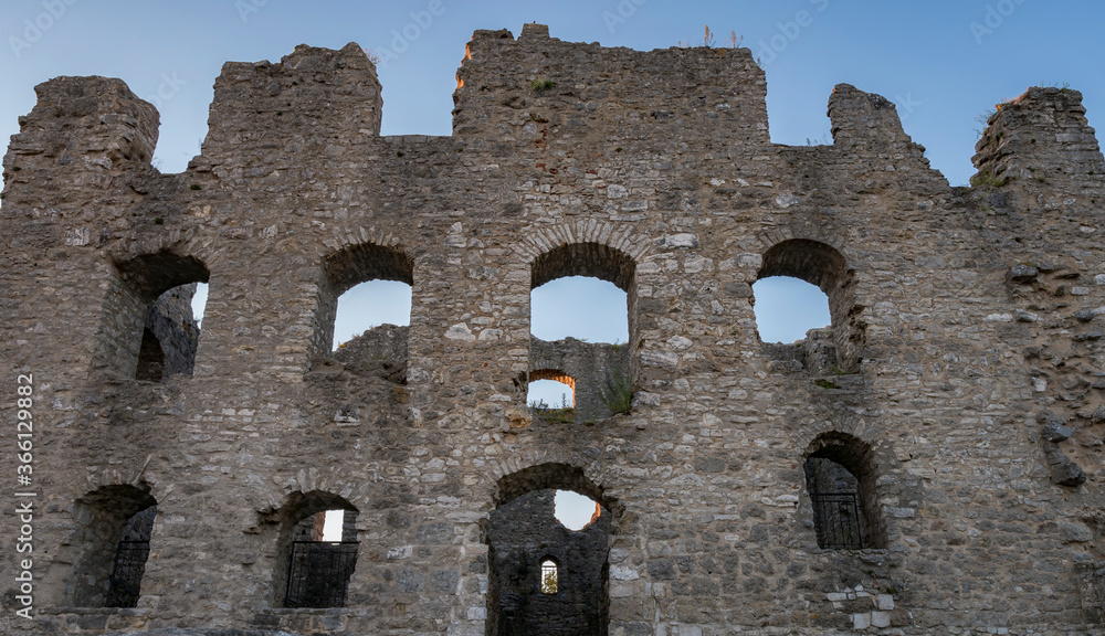 Great wall of castle ruin Wolfstein at Neumarkt, sunset evening in summer