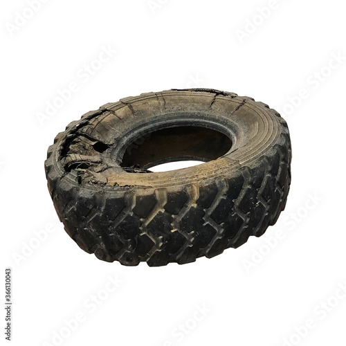 isolated from the background tire wheel suddenly broke, side, black tire with tread and holes, part of the wheel of a large car or truck, emergency, black rubber