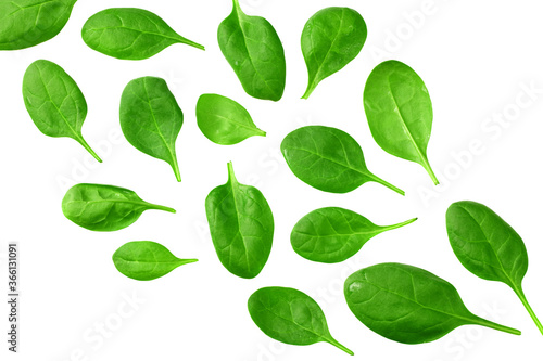 spinach leaves on wooden background. Healthy food. Top view.
