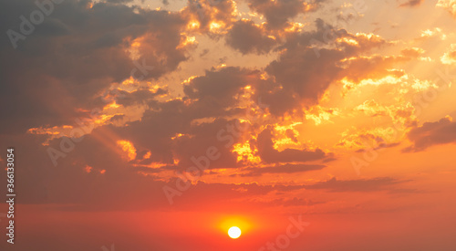 Fototapeta Naklejka Na Ścianę i Meble -  Beautiful colorful sunset sky with orange clouds. Nature sky background.