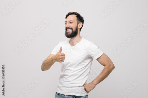 young man in white t-shirt shows like