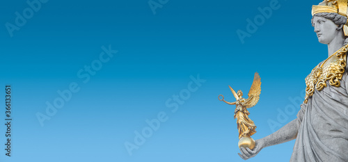 Canvas Print Banner with Athena statue at fountain (Pallas-Athene-Brunnen) in front of the Parliament holding Nike, an ancient Greek goddess for victory during sunset at blue sky, with copy space, Vienna, Austria